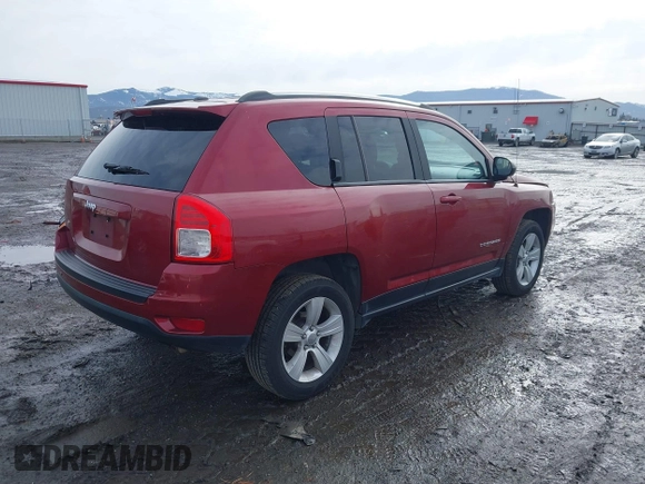 2013 Jeep Compass Sport with VIN 1C4NJDBB2DD207609, listed as a IAAI auction lot 41653746 with 121,697 mi miles. Bid and sale history available at carsss.com. Image 4.