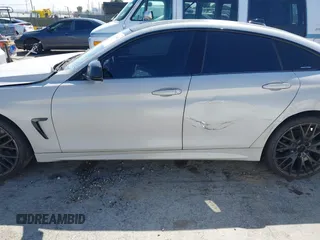 2015 BMW 4 Series 428i xDrive with VIN WBA4C9C54FD330582, listed as a IAAI auction lot 42135691 with 127,289 mi miles and . Bid and sale history available at DreamBid. Image 13.