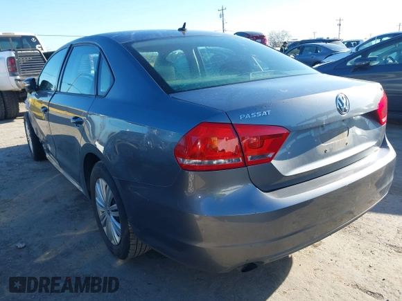 2015 Volkswagen Passat 1.8T Wolfsburg Ed with VIN 1VWAT7A3XFC010262, listed as a IAAI auction lot 41860210 with 99,775 mi miles. Bid and sale history available at carsss.com. Image 3.