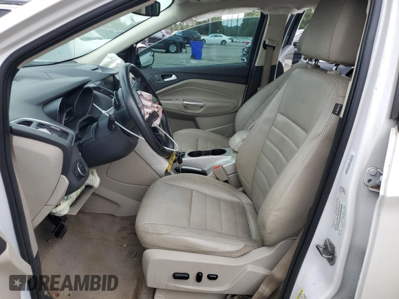 2013 Ford Escape SEL z VIN 1FMCU9HX4DUB05173, wystawiony jako Copart lot #57918125 z przebiegiem 197 195 mil mil oraz Szkoda całkowita • Salvage title. Historia ofert i sprzedaży dostępna na DreamBid. Obrazek 7.