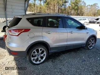2013 Ford Escape Titanium с VIN 1FMCU0J96DUB25142, выставлен на аукционе Copart как лот 75759094 с пробегом 167 809 миль миль и Списание • Salvage title. История ставок и продаж доступна на DreamBid. Изображение 3.