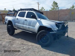 2013 Toyota Tacoma with VIN 5TFLU4EN2DX049615, listed as a IAAI auction lot 41893876 with 160,752 mi miles and . Bid and sale history available at DreamBid. Image 1.