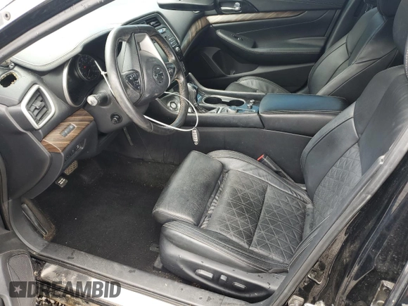2017 Nissan Maxima Platinum with VIN 1N4AA6APXHC417917, listed as a Copart auction lot 61005785 with 103,836 mi miles and Salvage title. Bid and sale history available at DreamBid. Image 7.