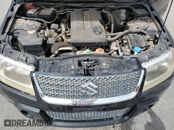 2012 Suzuki Grand Vitara z VIN JS3TE0D59C4100035, wystawiony jako Copart lot #51780435 z przebiegiem 49 620 mil mil oraz Czysty tytuł • Clean title. Historia ofert i sprzedaży dostępna na DreamBid. Obrazek 12.