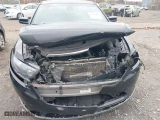 2015 Ford Taurus SHO with VIN 1FAHP2KT4FG121797, listed as a IAAI auction lot 40798440 with 135862 miles. Bid and sale history available at carsss.com. Image 6.