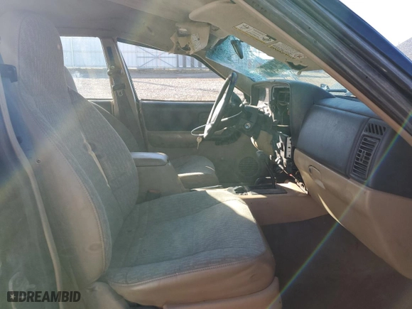 2000 Jeep Cherokee Police with VIN 1J4FF48S8YL103256, listed as a Copart auction lot 45959305 with 0 mi miles and Salvage Title. Bid and sale history available at carsss.com. Image 7.