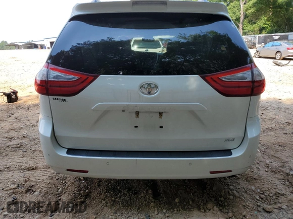 2018 Toyota Sienna XLE Auto Access Seat с VIN 5TDYZ3DC7JS905865, выставлен на аукционе Copart как лот 62263995 с пробегом Не указан миль и Списание • Salvage title. История ставок и продаж доступна на DreamBid. Изображение 6.