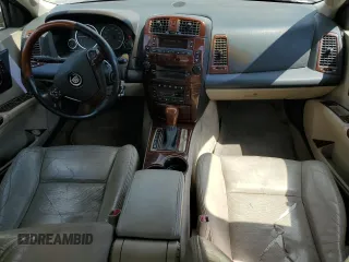 2005 Cadillac CTS z VIN 1G6DP567150200829, wystawiony jako Copart lot #54356015 z przebiegiem 161 238 mil mil oraz Szkoda całkowita • Salvage title. Historia ofert i sprzedaży dostępna na DreamBid. Obrazek 8.