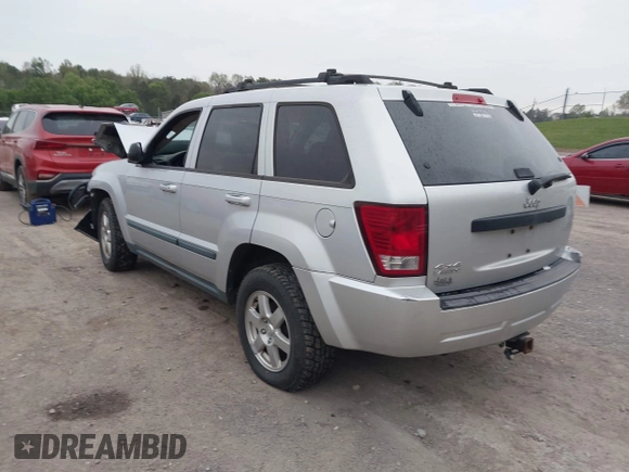 2009 Jeep Grand Cherokee Laredo with VIN 1J8GR48K09C557139, listed as a IAAI auction lot 41994604 with 1 mi miles. Bid and sale history available at carsss.com. Image 3.
