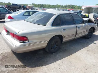 1995 Ford Crown Victoria с VIN 2FALP73W5SX140346, выставлен на аукционе IAAI как лот 41974429 с пробегом 166 540 миль миль и . История ставок и продаж доступна на DreamBid. Изображение 4.