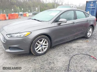 2014 Ford Fusion SE with VIN 3FA6P0HD1ER377527, listed as a IAAI auction lot 41929372 with 145,024 mi miles. Bid and sale history available at carsss.com. Image 2.