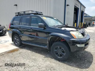 2006 Lexus GX 470 z VIN JTJBT20X660101641, wystawiony jako Copart lot #57242995 z przebiegiem 219 032 mil mil oraz Szkoda całkowita • Salvage title. Historia ofert i sprzedaży dostępna na DreamBid. Obrazek 4.