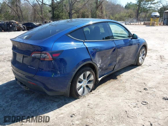 2021 Tesla Model Y Long Range with VIN 5YJYGAEE1MF207948, listed as a IAAI auction lot 41779570 with 100,859 mi miles. Bid and sale history available at carsss.com. Image 4.