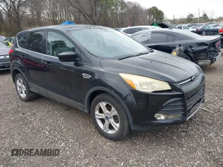 2016 Ford Escape SE z VIN 1FMCU9GXXGUB85326, wystawiony jako IAAI lot #41998862 z przebiegiem 122 272 mil mil oraz . Historia ofert i sprzedaży dostępna na DreamBid. Obrazek 1.