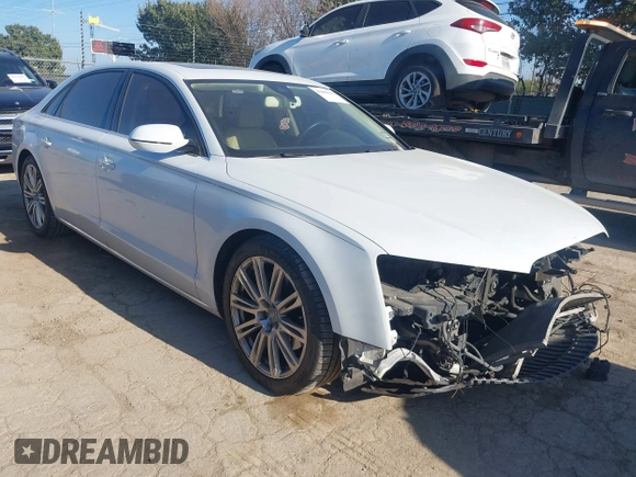 2014 Audi A8 3.0T z VIN WAURGAFDXEN006902, wystawiony jako IAAI lot #41099662 z przebiegiem 118 734 mil mil oraz . Historia ofert i sprzedaży dostępna na DreamBid. Obrazek 1.