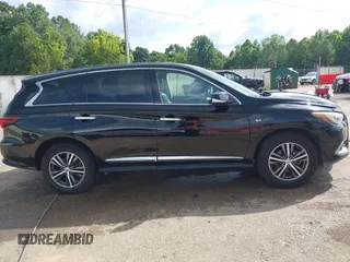 2016 Infiniti QX60 with VIN 5N1AL0MN7GC512506, listed as a IAAI auction lot 39811733 with 186,804 mi miles. Bid and sale history available at carsss.com. Image 13.