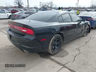 2013 Dodge Charger Police z VIN 2C3CDXAG5DH716369, wystawiony jako IAAI lot #41645644 z przebiegiem 127 535 mil mil oraz . Historia ofert i sprzedaży dostępna na DreamBid. Obrazek 4.