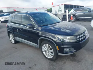 2012 Volkswagen Tiguan SE z VIN WVGAV7AX7CW504391, wystawiony jako IAAI lot #42240604 z przebiegiem 180 330 mil mil oraz . Historia ofert i sprzedaży dostępna na DreamBid. Obrazek 1.