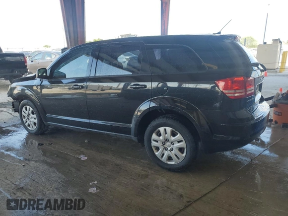 2013 Dodge Journey American Value with VIN 3C4PDCAB2DT684871, listed as a Copart auction lot 52288915 with 119,569 mi miles and Salvage title. Bid and sale history available at DreamBid. Image 2.