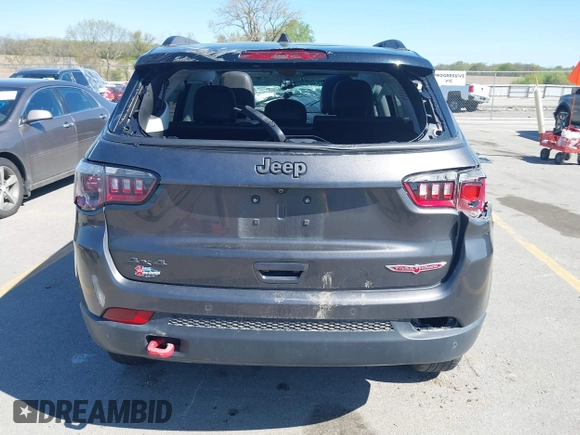 2019 Jeep Compass Trailhawk with VIN 3C4NJDDB0KT619337, listed as a IAAI auction lot 42171160 with 63,869 mi miles and . Bid and sale history available at DreamBid. Image 16.