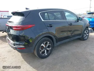 2020 Kia Sportage LX with VIN KNDPM3ACXL7701136, listed as a IAAI auction lot 41969998 with 89,102 mi miles. Bid and sale history available at carsss.com. Image 4.