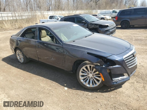 2019 Cadillac CTS Luxury AWD z VIN 1G6AX5SS1K0101825, wystawiony jako Copart lot #52970115 z przebiegiem 56 886 mil mil oraz Czysty tytuł • Clean title. Historia ofert i sprzedaży dostępna na DreamBid. Obrazek 4.