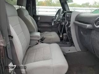 2009 Jeep Wrangler Sahara with VIN 1J4FA54109L702963, listed as a Copart auction lot 89211555 with 125,138 mi miles and Clean title. Bid and sale history available at DreamBid. Image 11.