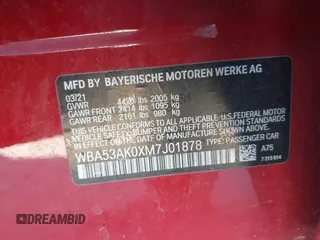 2021 BMW 2 Series 228i with VIN WBA53AK0XM7J01878, listed as a IAAI auction lot 41251154 with 61,199 mi miles. Bid and sale history available at carsss.com. Image 9.