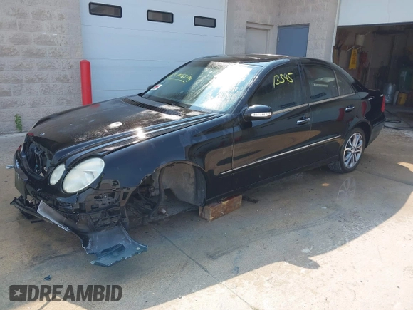 2003 Mercedes-Benz E-Class 3.2L with VIN WDBUF65J93A234140, listed as a IAAI auction lot 40313345 with 1 mi miles. Bid and sale history available at carsss.com. Image 2.
