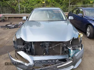 2015 Infiniti Q50 with VIN JN1BV7AR9FM418836, listed as a IAAI auction lot 42181355 with 165,787 mi miles and . Bid and sale history available at DreamBid. Image 13.