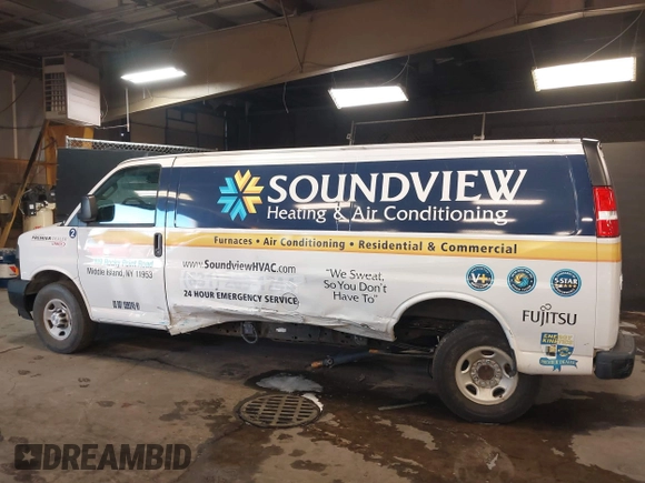 2020 Chevrolet Express Cargo Van with VIN 1GCWGBFB4L1205443, listed as a IAAI auction lot 41612714 with 87,883 mi miles. Bid and sale history available at carsss.com. Image 14.