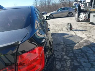 2015 BMW 3 Series 328i with VIN WBA3C1C53FK120984, listed as a IAAI auction lot 41338035 with 119,486 mi miles and . Bid and sale history available at carsss.com. Image 17.