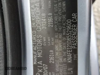 2008 Kia Spectra EX z VIN KNAFE121085529600, wystawiony jako Copart lot #59727105 z przebiegiem 132 306 mil mil oraz Szkoda całkowita • Salvage title. Historia ofert i sprzedaży dostępna na DreamBid. Obrazek 12.