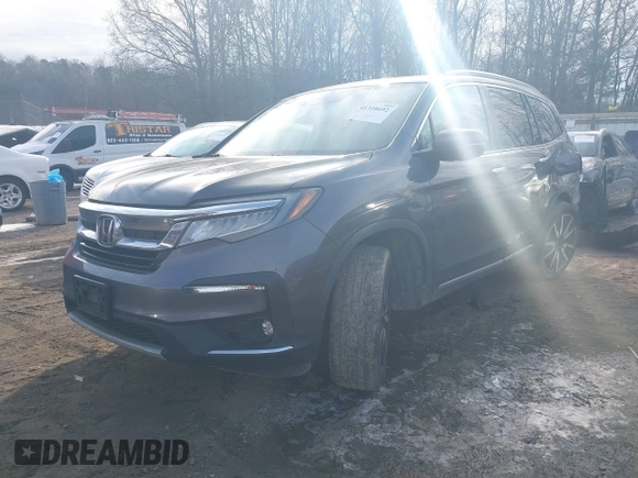 2019 Honda Pilot Touring 7-Passenger with VIN 5FNYF6H67KB018769, listed as a IAAI auction lot 41310452 with 92,499 mi miles. Bid and sale history available at carsss.com. Image 16.