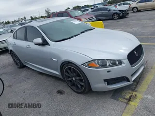 2015 Jaguar XF V6 Portfolio with VIN SAJWA0F79F8U77985, listed as a IAAI auction lot 41386030 with 81,335 mi miles. Bid and sale history available at carsss.com. Image 1.
