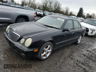 2001 Mercedes-Benz E-Class with VIN WDBJF70J31B324620, listed as a Copart auction lot 47748555 with 160,041 mi miles and Salvage Title. Bid and sale history available at carsss.com. Image 1.