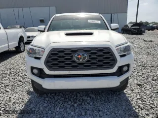 2020 Toyota Tacoma 4WD SR5 with VIN 3TYCZ5AN2LT006401, listed as a Copart auction lot 53909335 with 164,713 mi miles and Non Repairable. Bid and sale history available at carsss.com. Image 5.