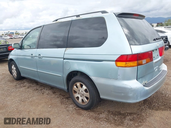 2004 Honda Odyssey EX-L with VIN 5FNRL18064B060817, listed as a IAAI auction lot 42032796 with 200,999 mi miles and . Bid and sale history available at DreamBid. Image 3.