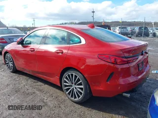 2020 BMW 2 Series 228i xDrive with VIN WBA73AK05L7F66529, listed as a IAAI auction lot 41575774 with 53,647 mi miles. Bid and sale history available at carsss.com. Image 3.