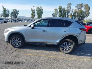2021 Mazda CX-5 Grand Touring with VIN JM3KFADM1M1393251, listed as a IAAI auction lot 42072862 with 47,758 mi miles. Bid and sale history available at carsss.com. Image 14.