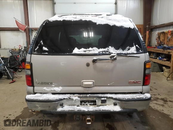 2006 GMC Yukon SLT with VIN 1GKEK13T76J149735, listed as a Copart auction lot 43025715 with 304,493 mi miles and Salvage Title. Bid and sale history available at carsss.com. Image 6.