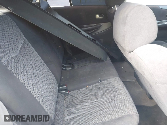 2002 Mazda Protege with VIN JM1BJ245921455563, listed as a IAAI auction lot 42064853 with Not Provided miles and . Bid and sale history available at DreamBid. Image 8.
