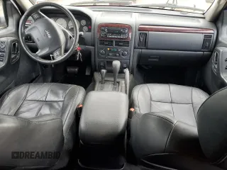 2004 Jeep Grand Cherokee Limited with VIN 1J4GW58N64C174387, listed as a Copart auction lot 43539585 with 138,433 mi miles and Salvage title. Bid and sale history available at DreamBid. Image 8.