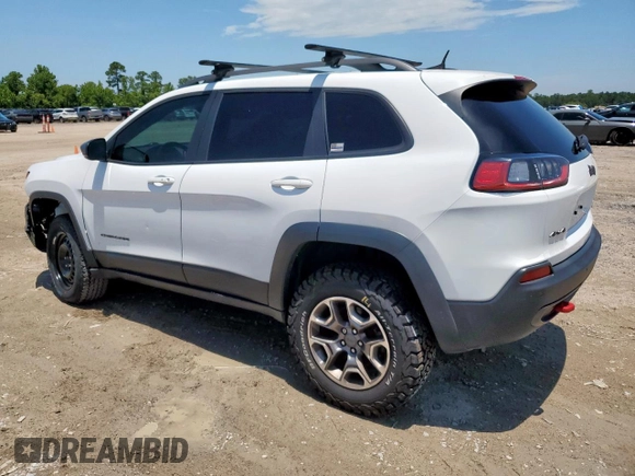 2020 Jeep Cherokee Trailhawk с VIN 1C4PJMBX4LD609103, выставлен на аукционе Copart как лот 60469955 с пробегом 70 179 миль миль и Списание • Salvage title. История ставок и продаж доступна на DreamBid. Изображение 2.