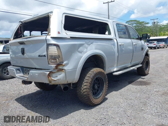 2018 Ram 2500 Laramie with VIN 3C6UR5FL3JG301310, listed as a IAAI auction lot 42239570 with 189,853 mi miles and . Bid and sale history available at DreamBid. Image 4.