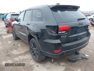2018 Jeep Grand Cherokee Laredo E with VIN 1C4RJFAG5JC280033, listed as a IAAI auction lot 41953744 with 69,269 mi miles and . Bid and sale history available at DreamBid. Image 3.