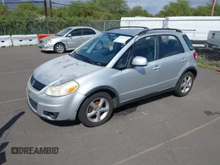 2009 Suzuki SX4 Man FWD with VIN JS2YA413396201567, listed as a IAAI auction lot 41567377 with 110,894 mi miles. Bid and sale history available at carsss.com. Image 2.