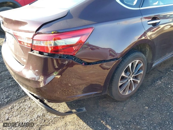 2018 Toyota Avalon XLE with VIN 4T1BK1EB2JU284174, listed as a IAAI auction lot 41555900 with 141,004 mi miles. Bid and sale history available at carsss.com. Image 19.