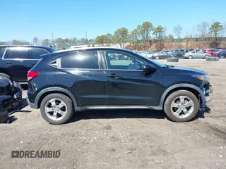 2016 Honda HR-V EX-L w/Navi with VIN 3CZRU6H71GM760696, listed as a IAAI auction lot 41830868 with 129,243 mi miles. Bid and sale history available at carsss.com. Image 13.