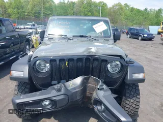 2021 Jeep Wrangler Unlimited Willys с VIN 1C4HJXDNXMW815548, выставлен на аукционе IAAI как лот 42226665 с пробегом 55 457 миль миль и . История ставок и продаж доступна на DreamBid. Изображение 12.